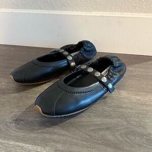 Black leather studded flats